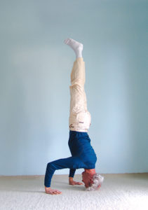 Headstand- arms- in front position