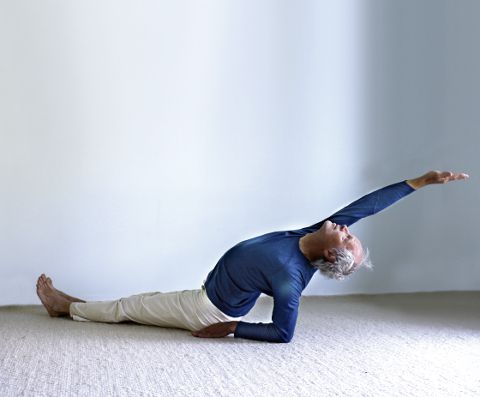 Preparatory exercise for the fish in which the thoracic spine arches out.